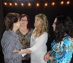 Singing an impromptu song with Cheryl White, Linda Davis, and Sharon White 